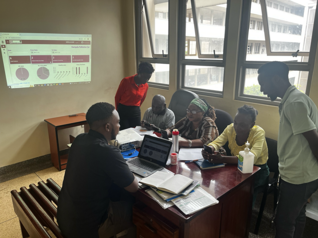 mPallCare Trainers training health workers at Mulago Hospital